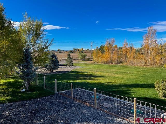 55339 Begonia Road Delta, CO 81416 - Photo 18 of 34 a view of a golf course with a garden