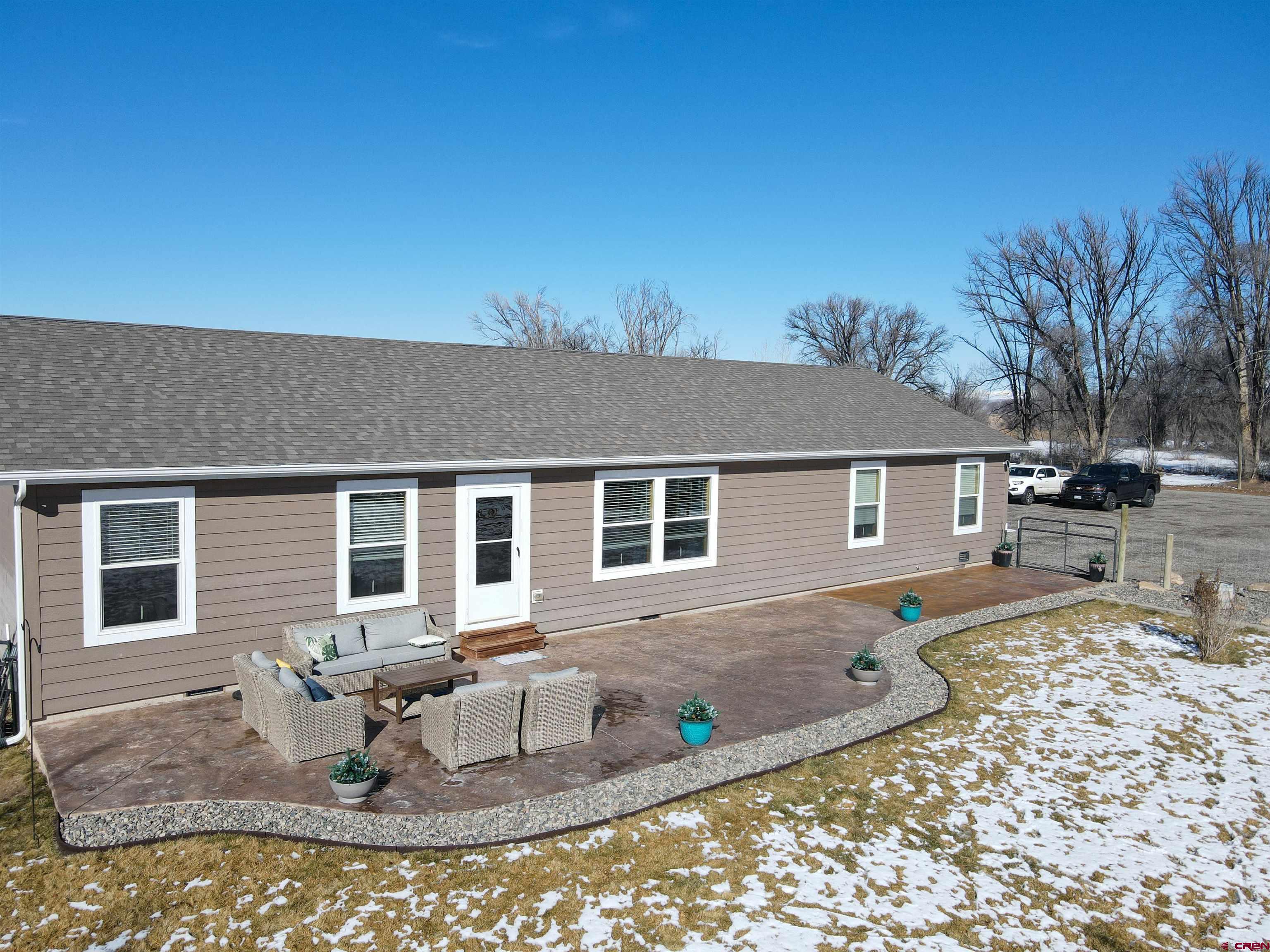 55339 Begonia Road Delta, CO 81416 - Photo 19 of 34 a front view of a house with garden