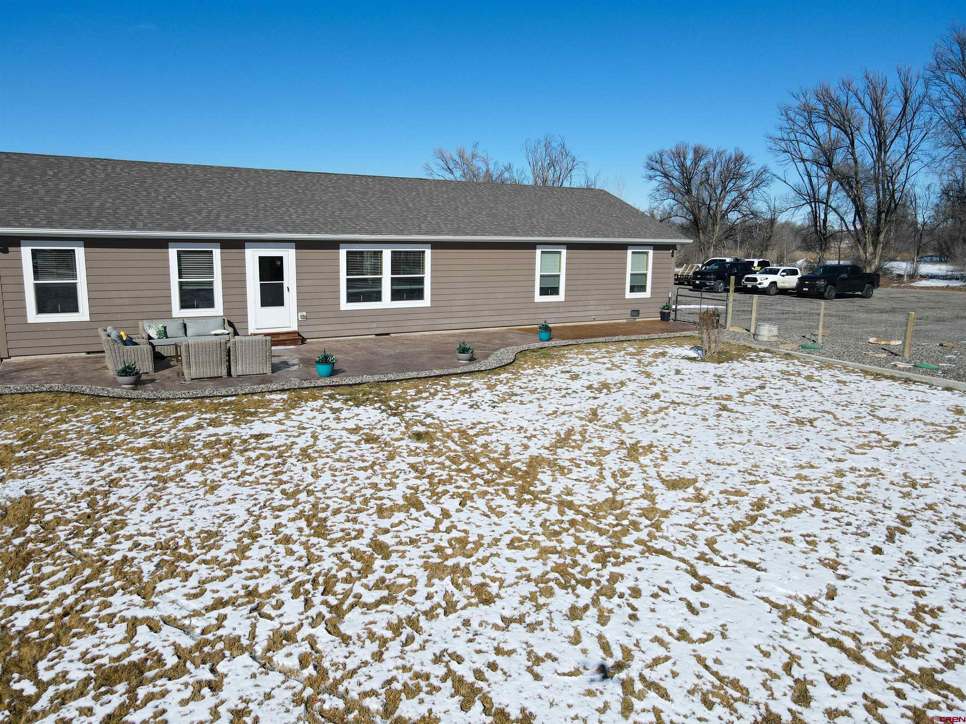 55339 Begonia Road Delta, CO 81416 - Photo 21 of 34 front view of a house with a bench