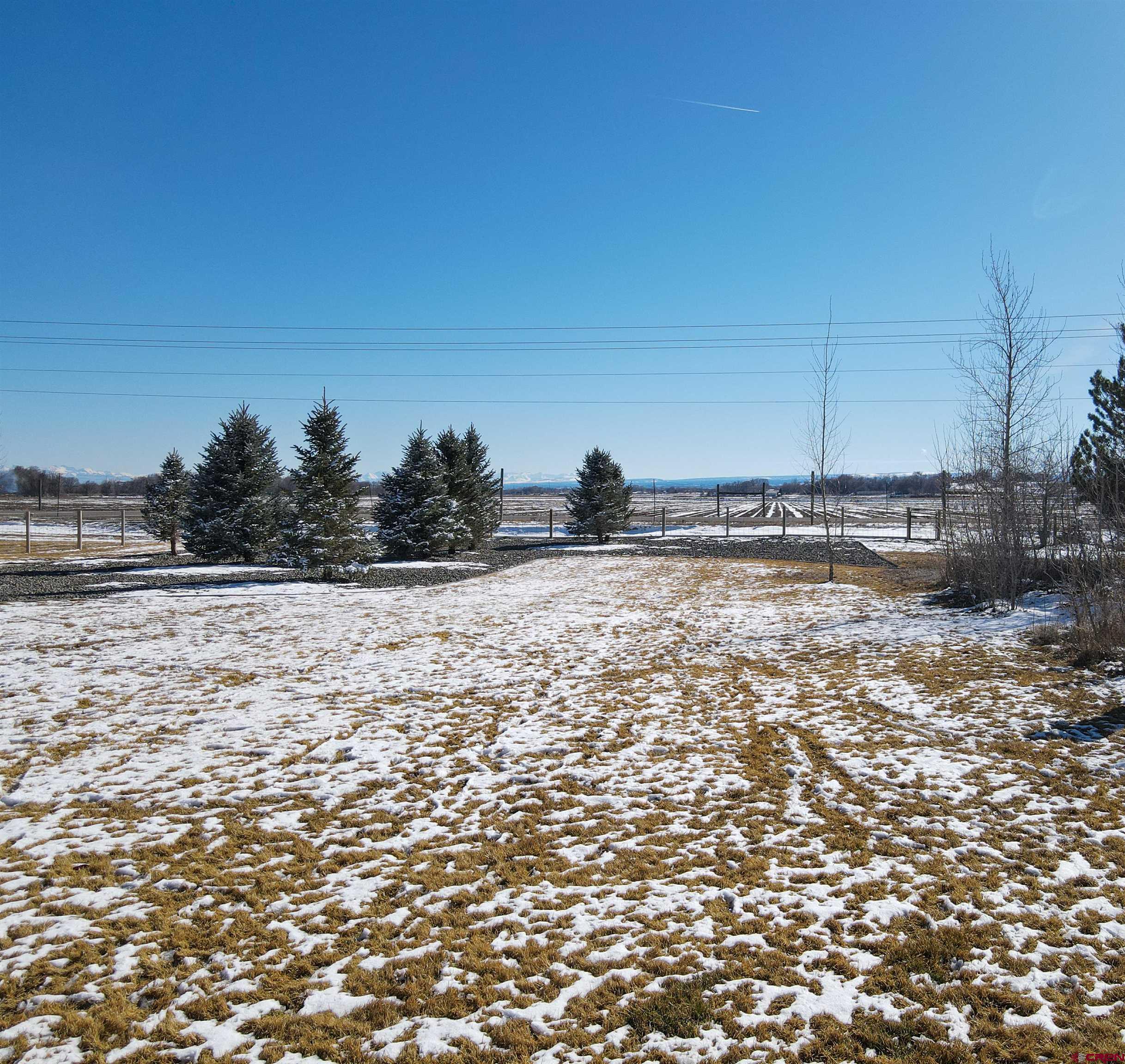 55339 Begonia Road Delta, CO 81416 - Photo 24 of 34 a view of a yard with wooden fence
