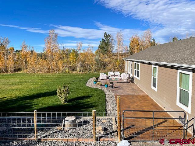55339 Begonia Road Delta, CO 81416 - Photo 26 of 34 a view of a backyard with sitting area