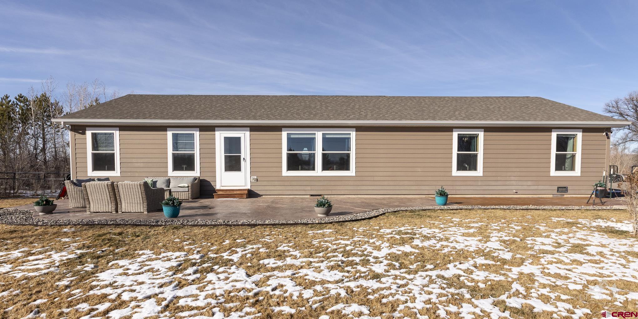 55339 Begonia Road Delta, CO 81416 - Photo 28 of 34 a front view of house with outdoor space