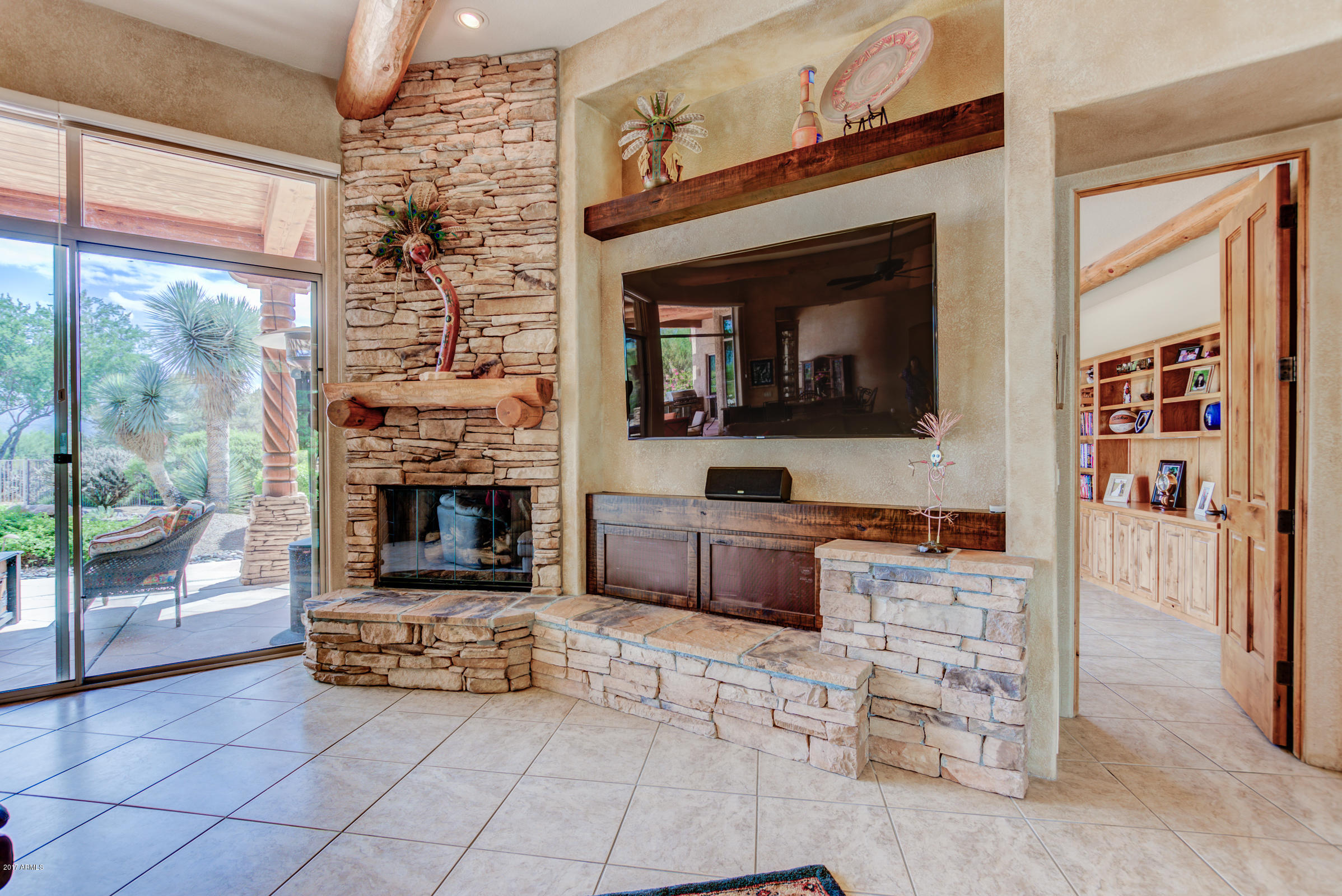 18402 East Picacho Road Rio Verde, AZ 85263 - Photo 5 of 43 Entertainment wall w/fireplace
