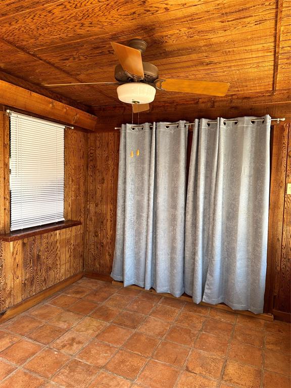 2301 Post Oak Road Abilene, TX 79605 - Photo 29 of 36 Sunroom with curtains over french doors for privacy; sunroom to belong to the tenants of the big house!