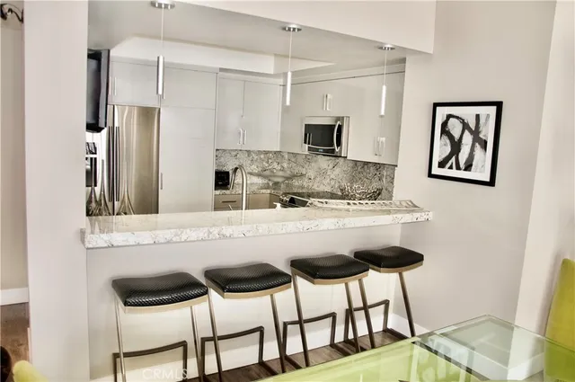 a view of balcony with furniture