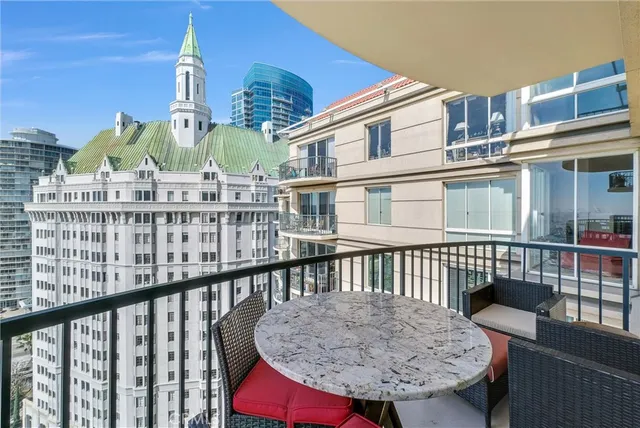 a bathroom with a shower sink and mirror