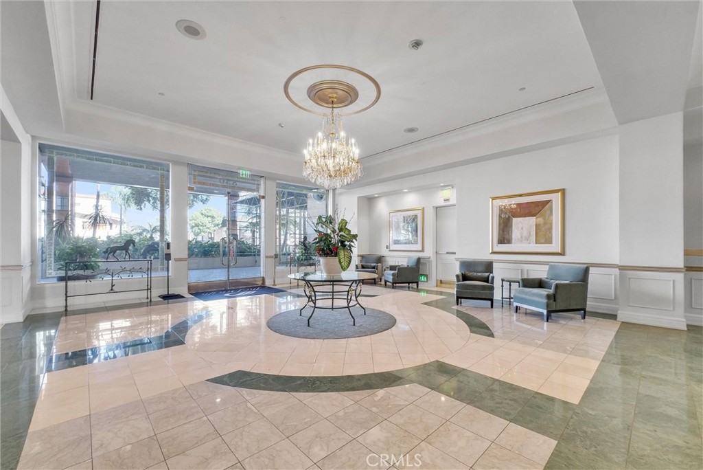 850 East Ocean Boulevard, Unit 1506 Long Beach, CA 90802 - Photo 28 of 58 a living room with furniture and a chandelier