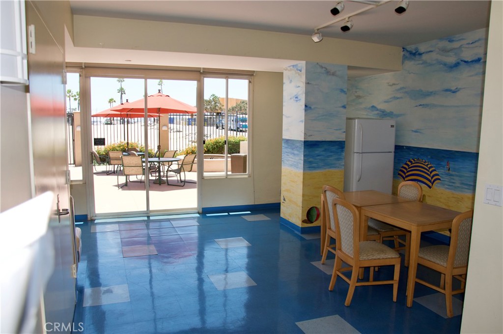 850 East Ocean Boulevard, Unit 1506 Long Beach, CA 90802 - Photo 47 of 58 a view of a kitchen with furniture and wooden floor