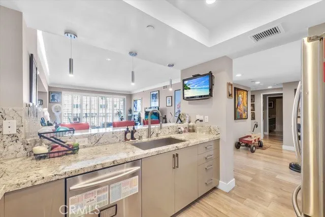 a kitchen with a table and chairs