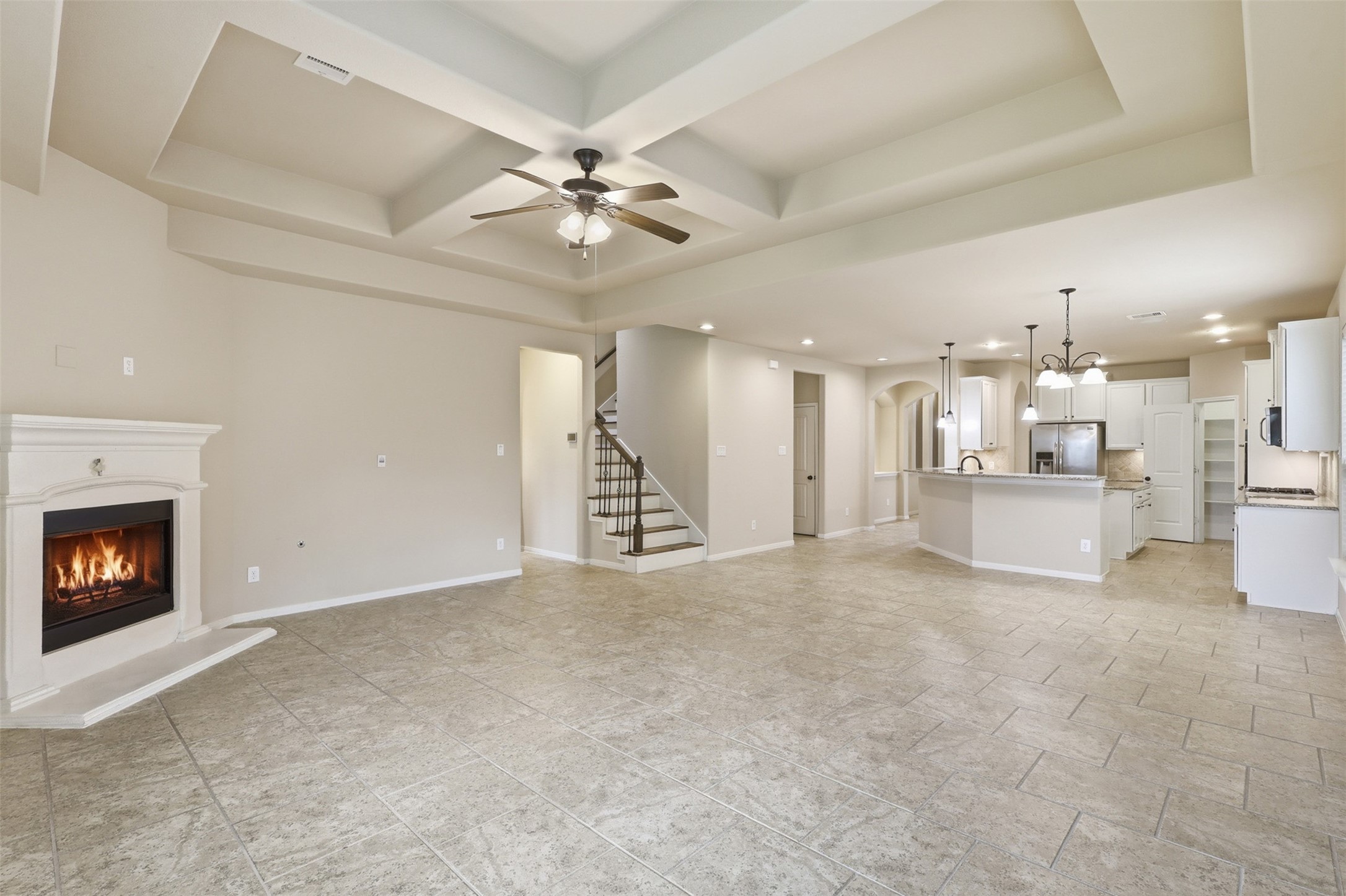 22943 Dale River Road Tomball, TX 77375 - Photo 11 of 29 a view of an empty room with a fireplace and a window