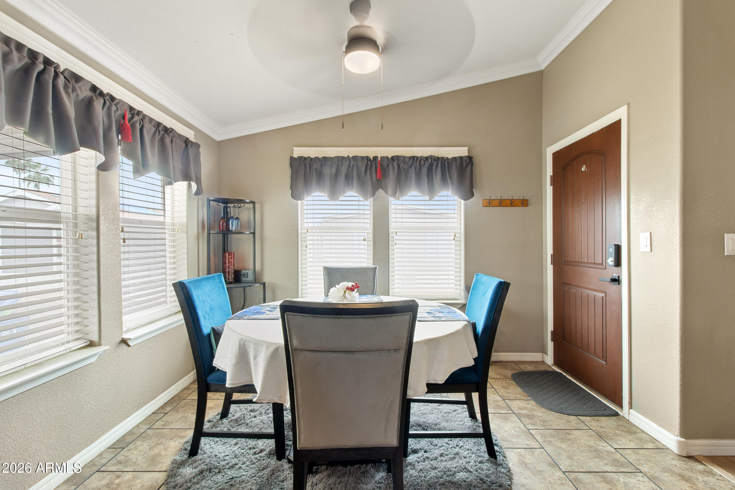 400 West Baseline Road, Unit 220 Tempe, AZ 85283 - Photo 11 of 52 a dining room with furniture and window
