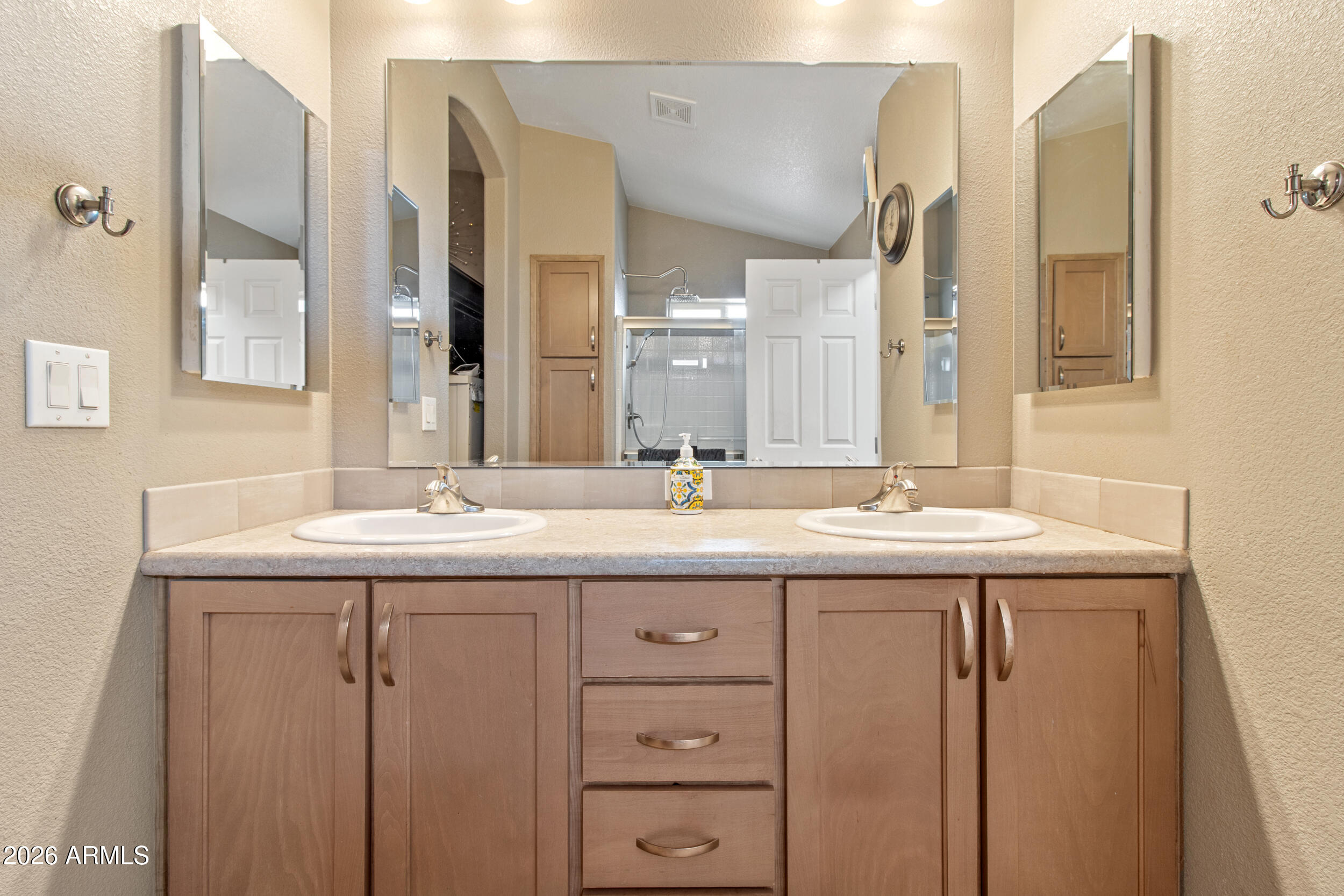 400 West Baseline Road, Unit 220 Tempe, AZ 85283 - Photo 26 of 52 a bathroom with a sink and a mirror