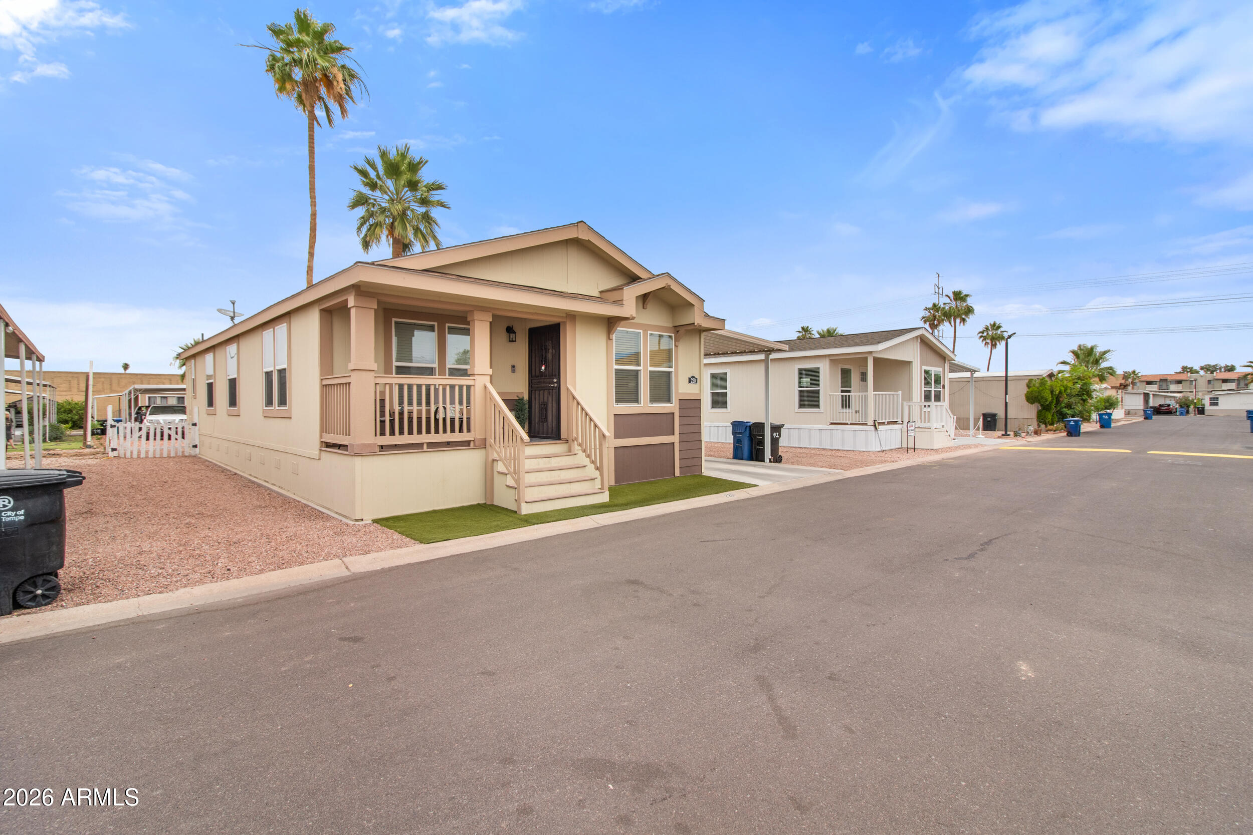 400 West Baseline Road, Unit 220 Tempe, AZ 85283 - Photo 29 of 52 a front view of a house with a garden
