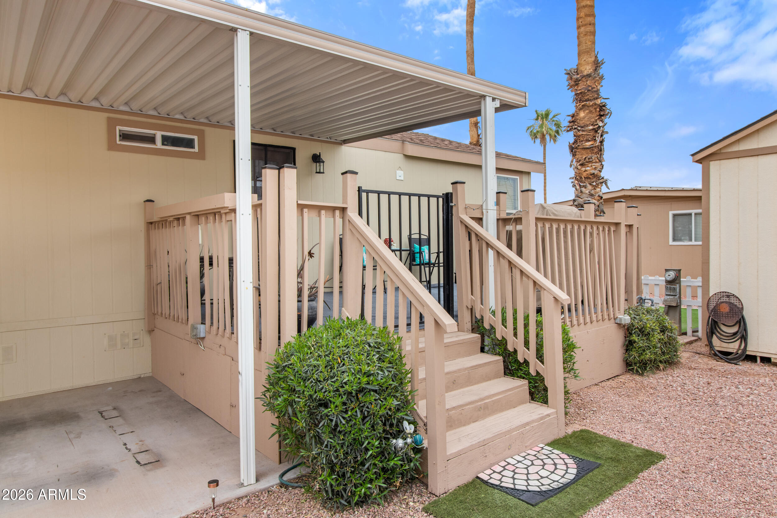 400 West Baseline Road, Unit 220 Tempe, AZ 85283 - Photo 32 of 52 a view of a porch with potted plants