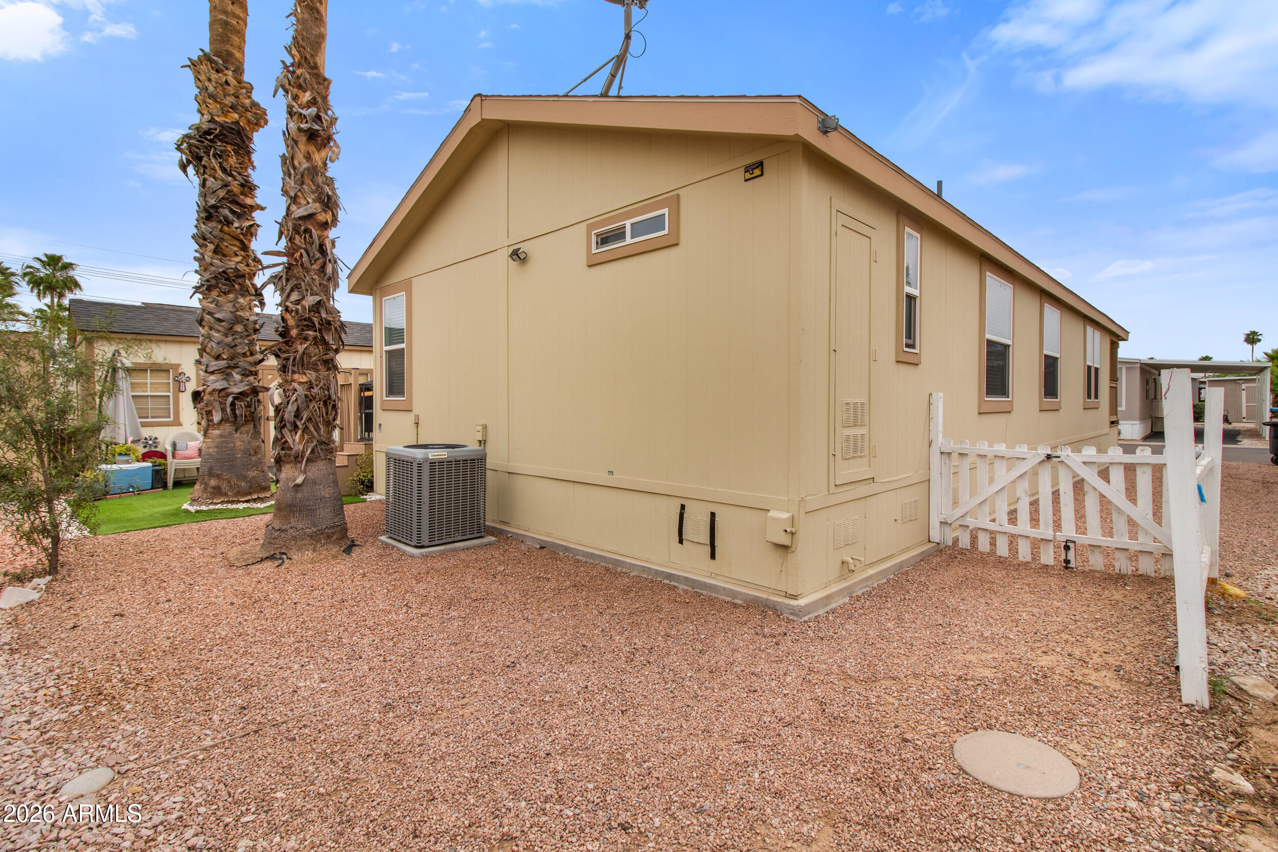 400 West Baseline Road, Unit 220 Tempe, AZ 85283 - Photo 34 of 52 a view of a house with a yard