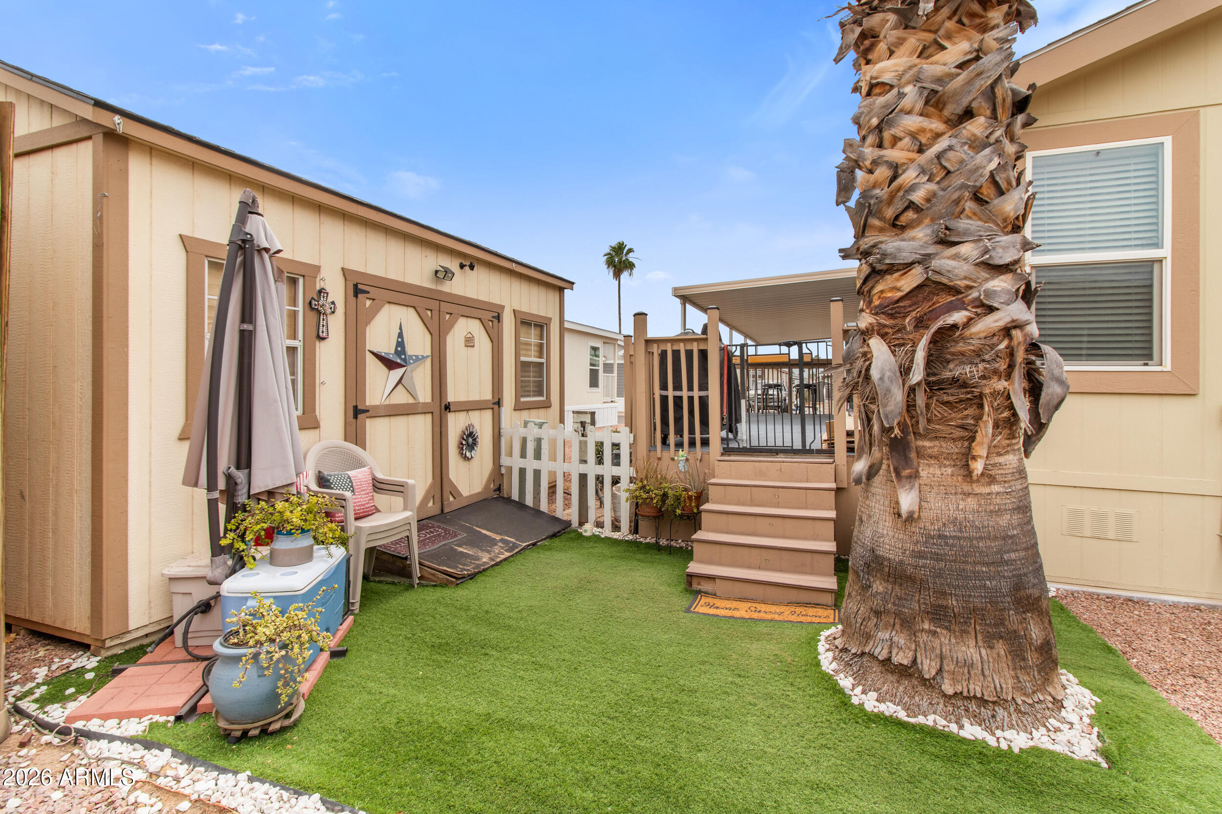 400 West Baseline Road, Unit 220 Tempe, AZ 85283 - Photo 35 of 52 a front view of a house with outdoor seating