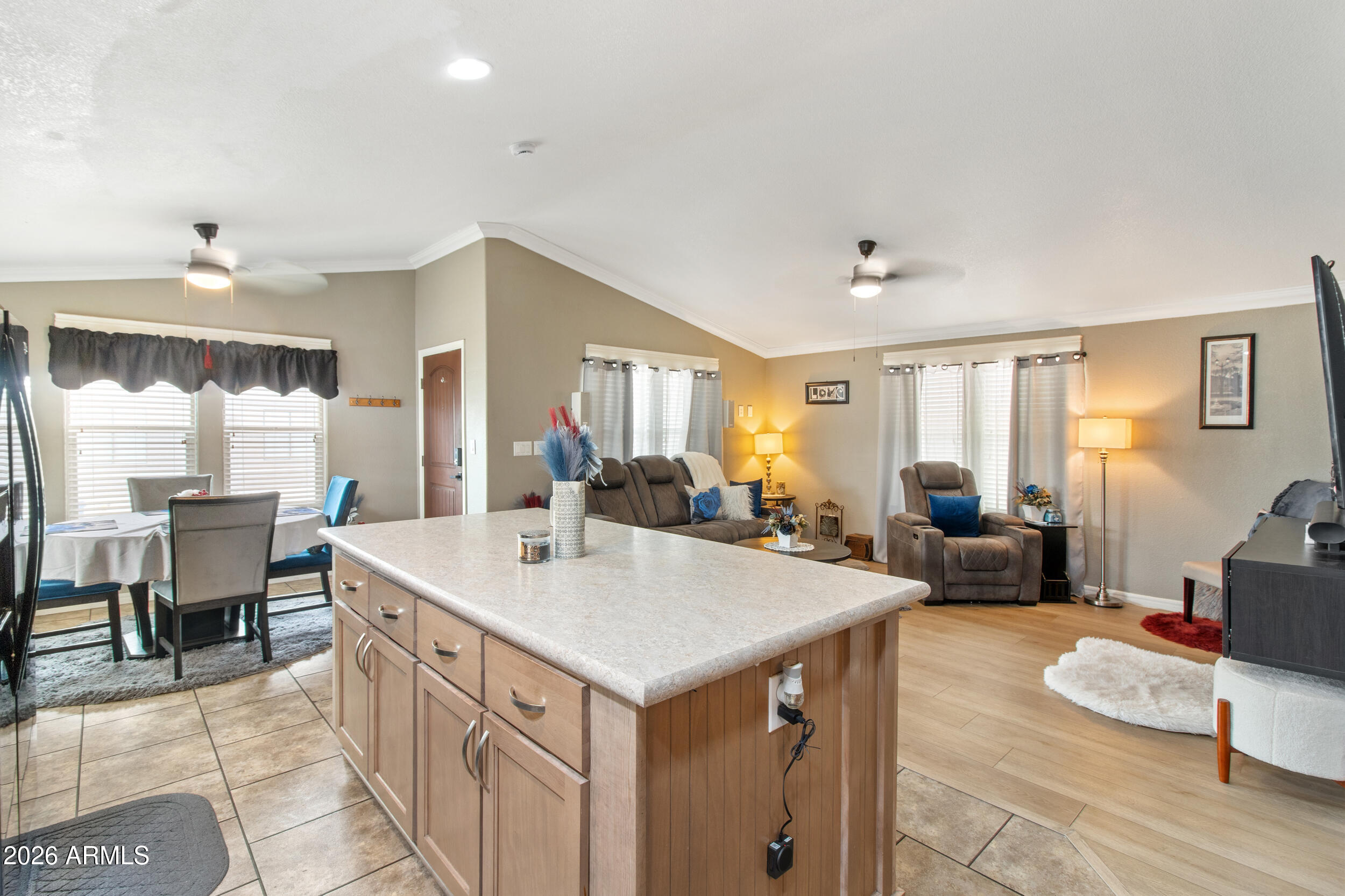 400 West Baseline Road, Unit 220 Tempe, AZ 85283 - Photo 9 of 52 a view of kitchen island a sink and living room