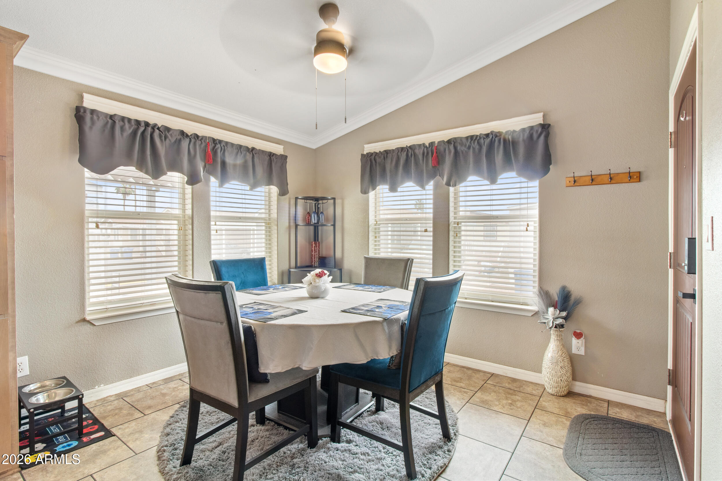 400 West Baseline Road, Unit 220 Tempe, AZ 85283 - Photo 10 of 52 a view of a dining room with furniture and window