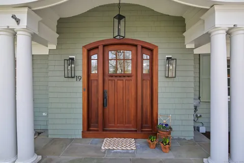 a front view of a house with a door