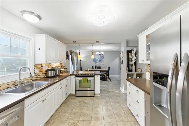 $339,900 | 915 Northwest 63rd Street, Kansas City, MO 64118