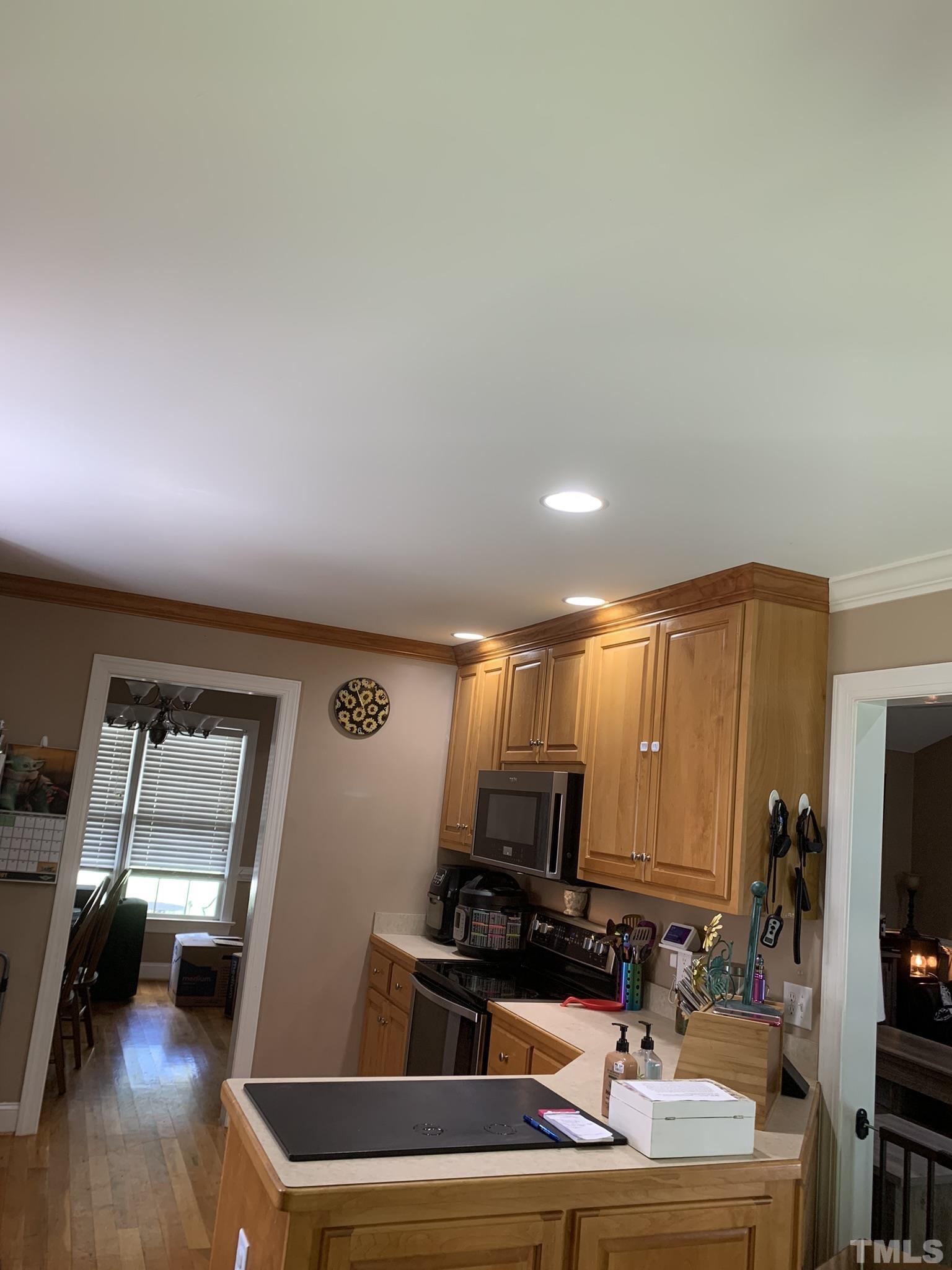 102 Younger Road Roxboro, NC 27573 - Photo 11 of 16 a room with furniture and a flat screen tv