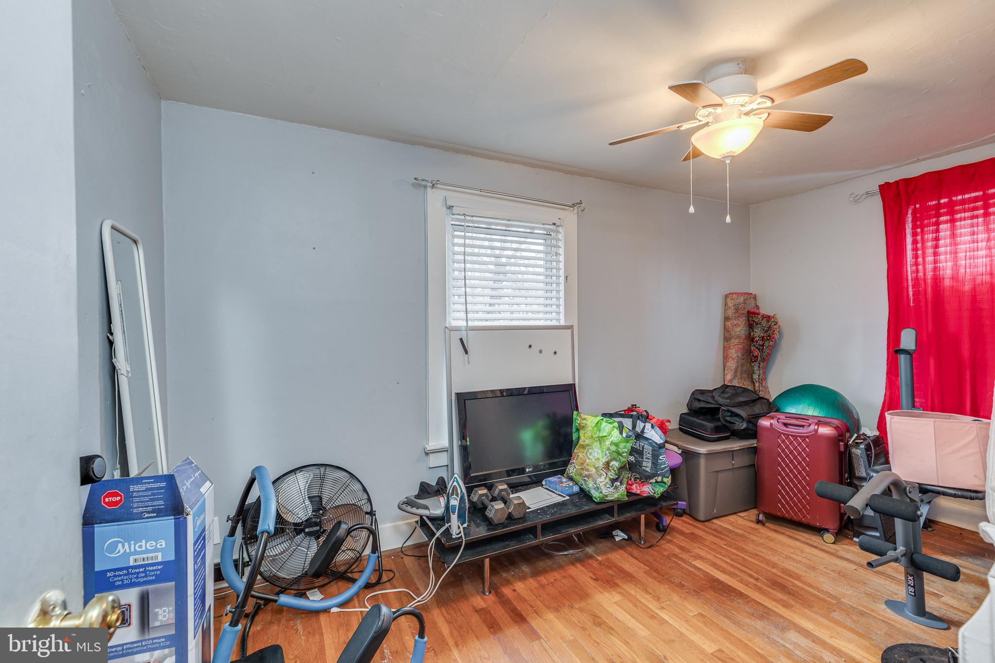 26 Chestnut Street Lumberton, NJ 08048 - Photo 13 of 32 a room with furniture and a chandelier fan