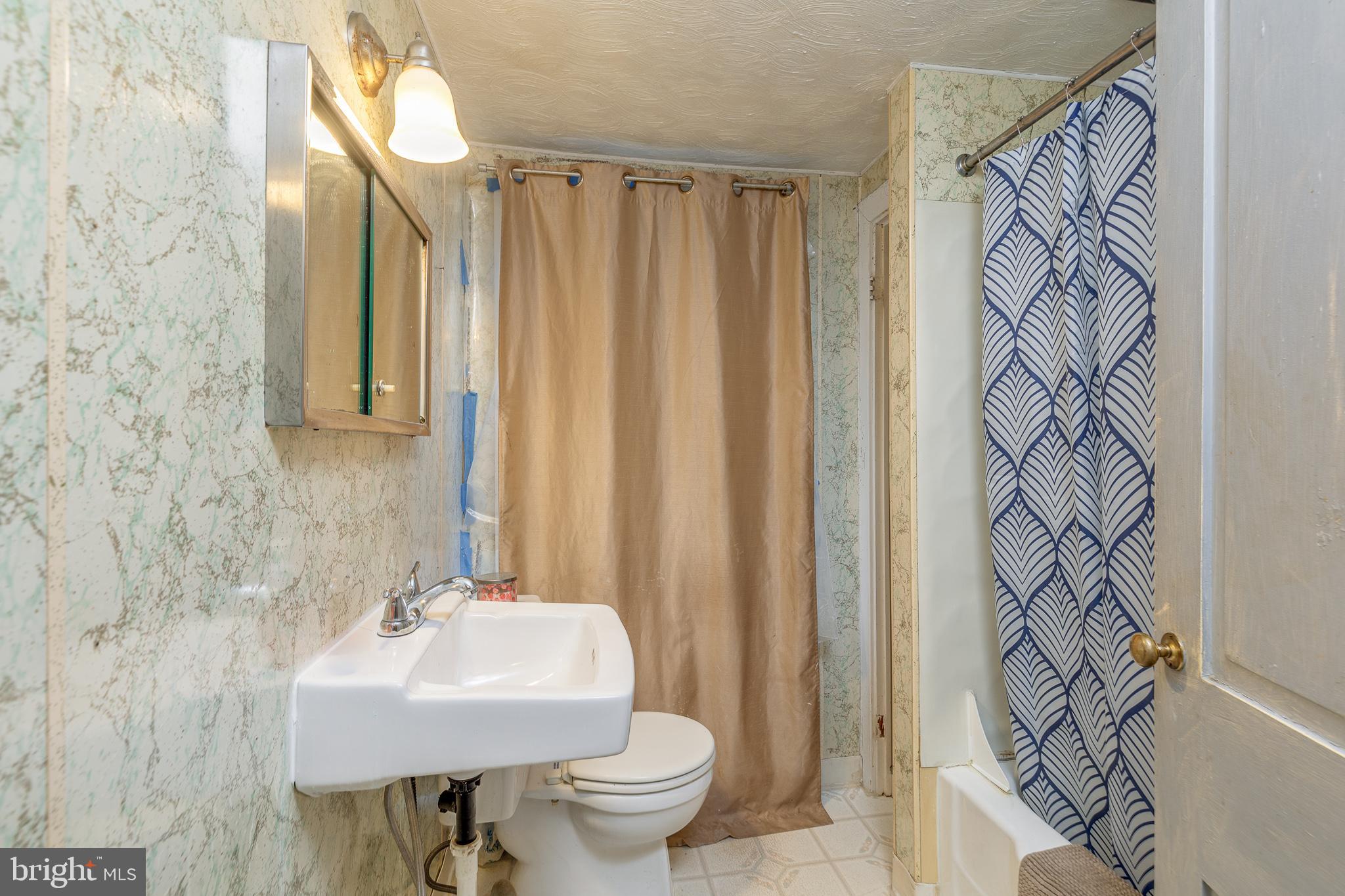 26 Chestnut Street Lumberton, NJ 08048 - Photo 14 of 32 a bathroom with a sink and a toilet