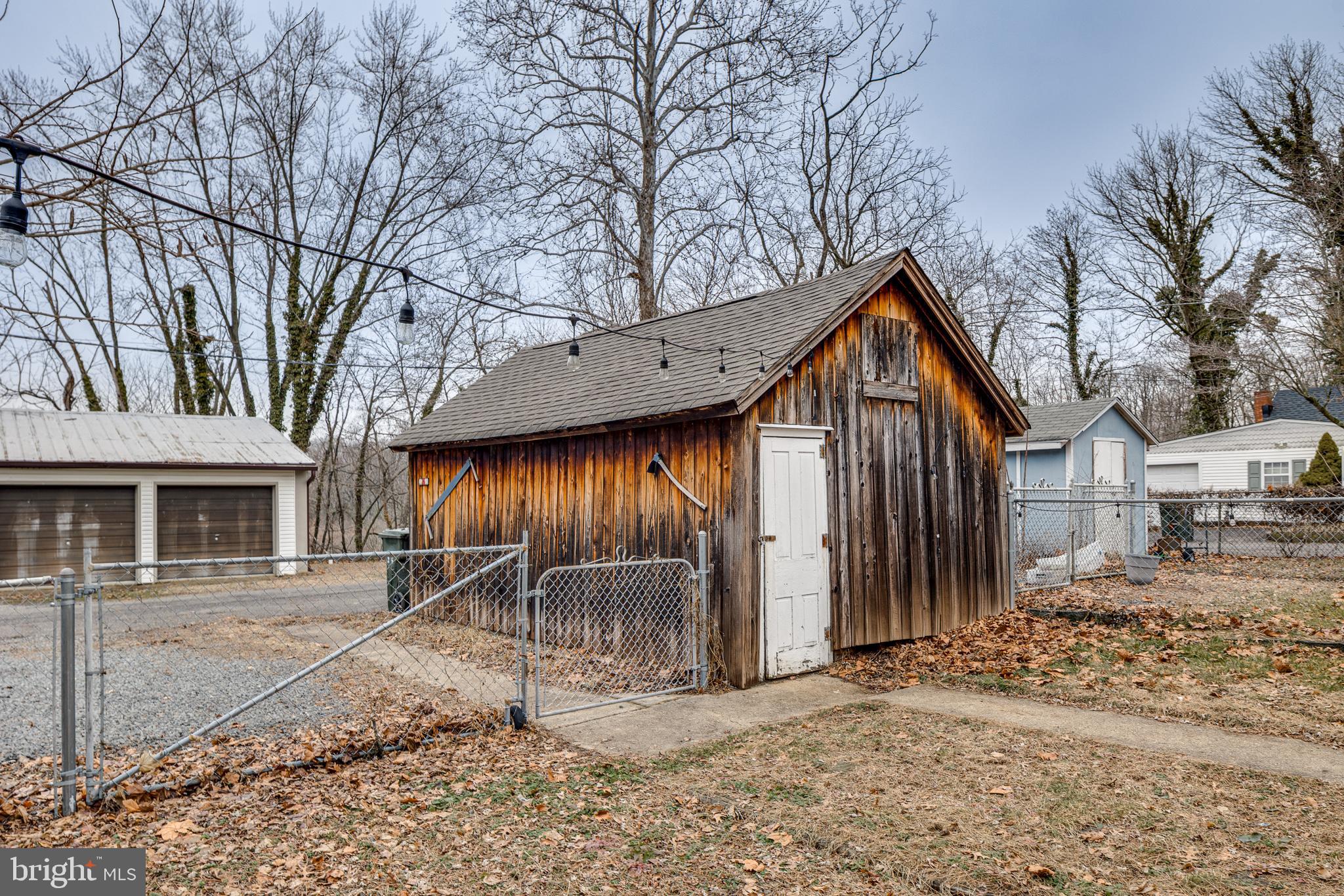 26 Chestnut Street Lumberton, NJ 08048 - Photo 25 of 32 a view of a house with a yard covered in snow