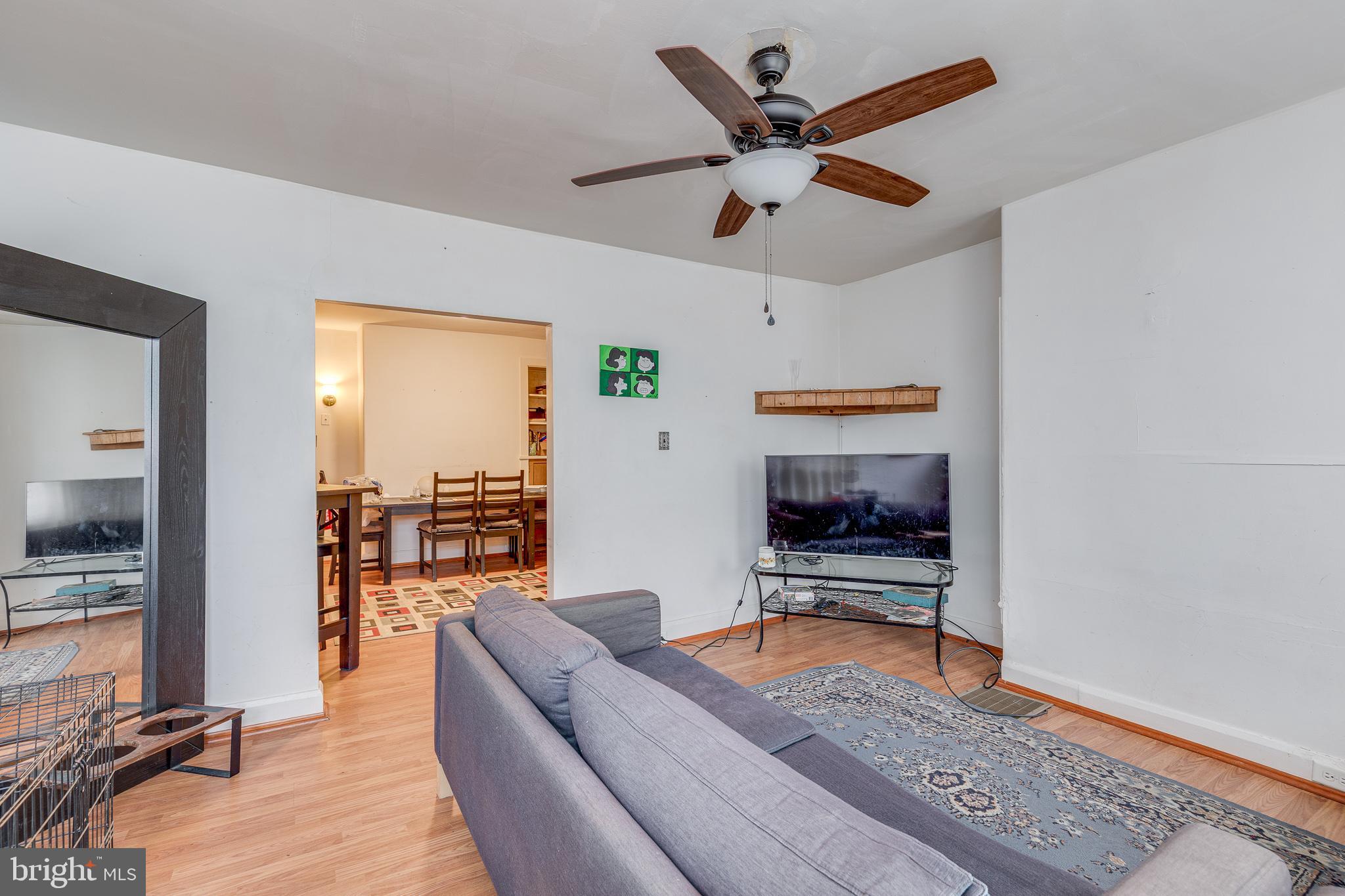 26 Chestnut Street Lumberton, NJ 08048 - Photo 3 of 32 a living room with furniture and a chandelier