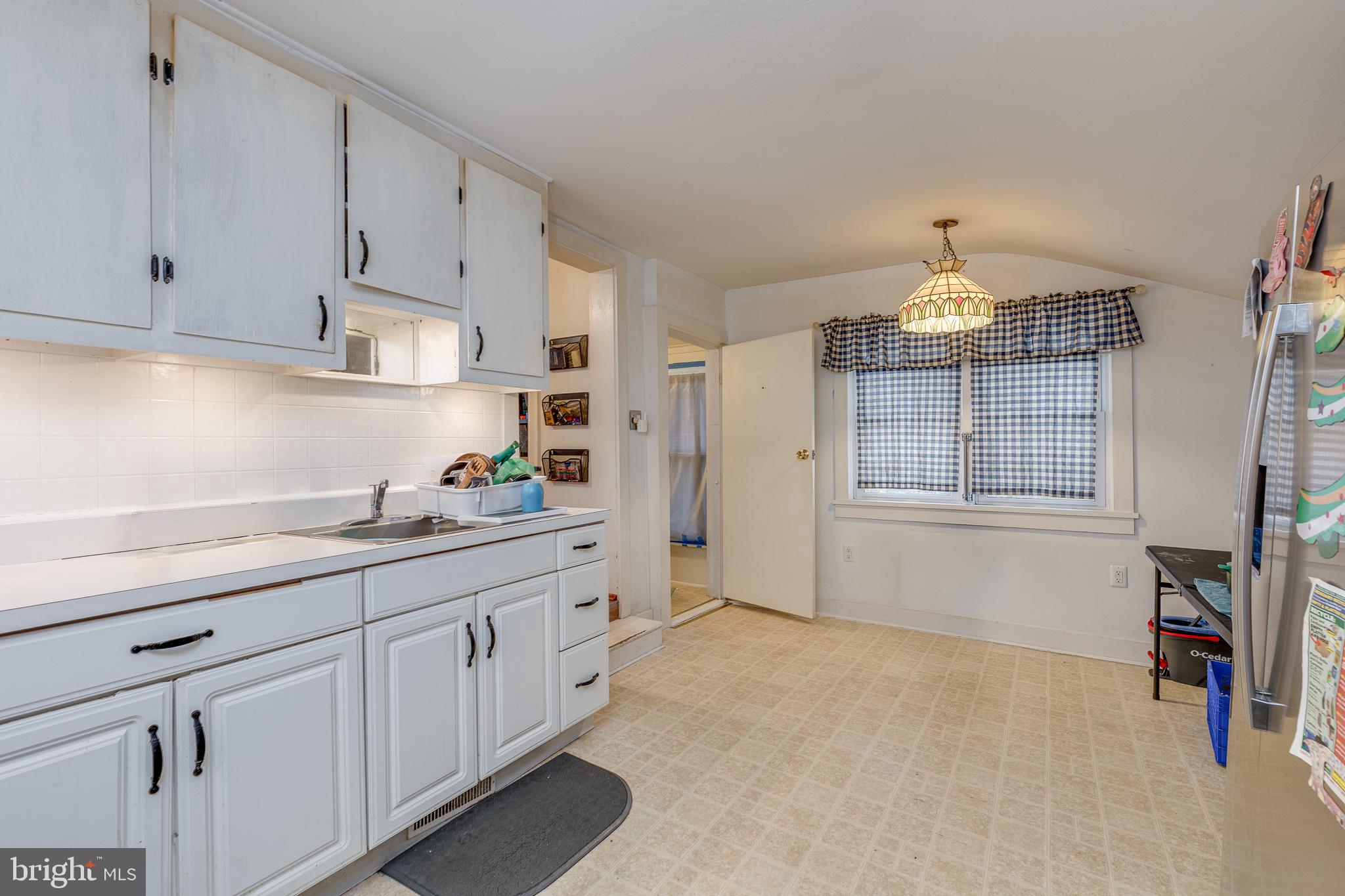 26 Chestnut Street Lumberton, NJ 08048 - Photo 8 of 32 a kitchen with cabinets and window