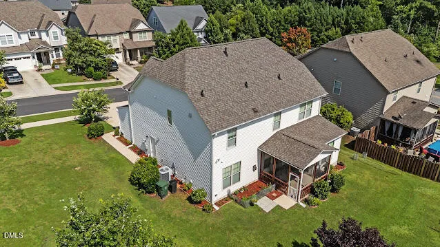 an aerial view of a house with a garden