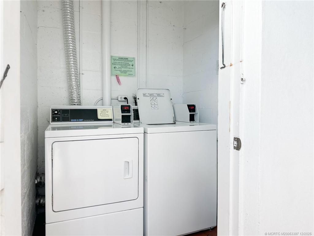 2600 Southeast Ocean Boulevard, Unit II1 Stuart, FL 34996 - Photo 27 of 38 a utility room with dryer and washer
