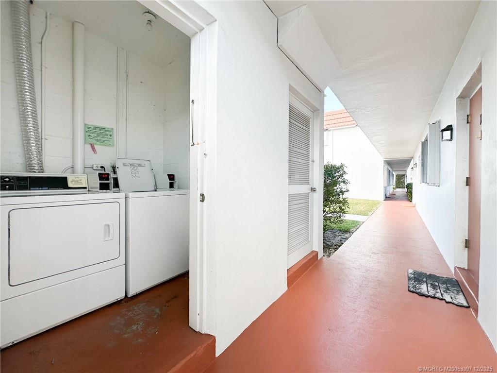 2600 Southeast Ocean Boulevard, Unit II1 Stuart, FL 34996 - Photo 28 of 38 a view of a kitchen with white cabinets