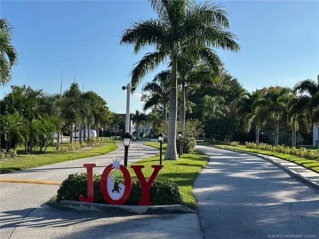 a park with palm trees and palm trees