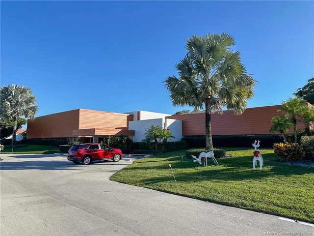 a car parked in front of a house