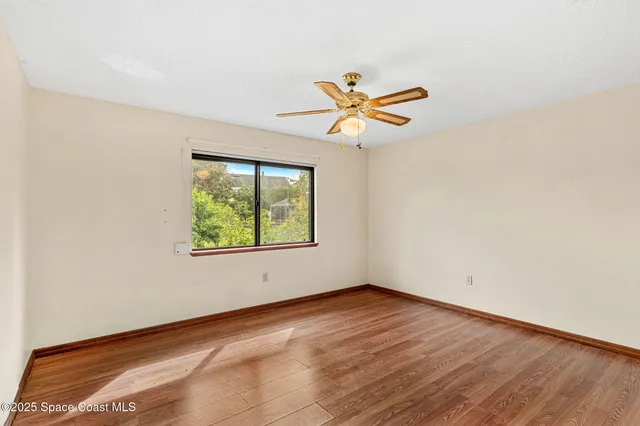 an aerial view of house with a swimming pool