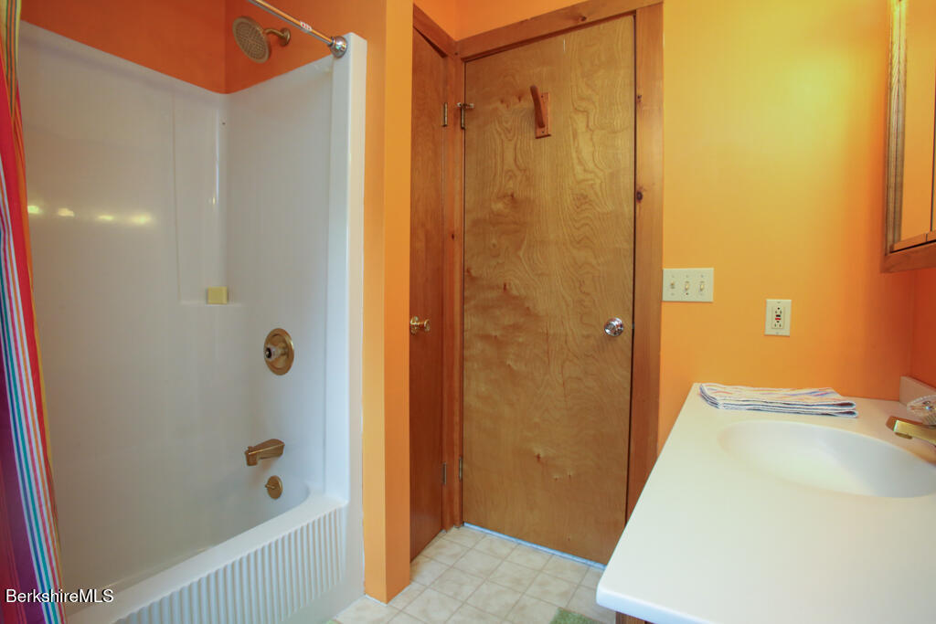 1271 Main Road Savoy, MA 01256 - Photo 29 of 38 a bathroom with a tub and shower