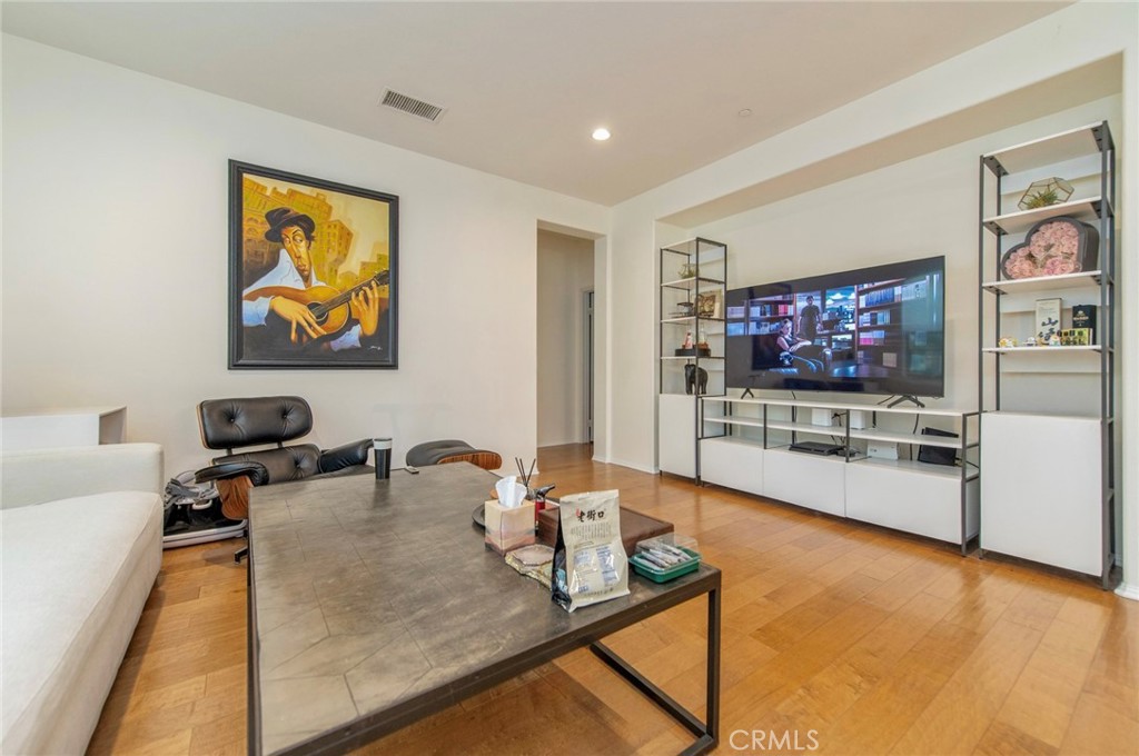 579 Boxwood Lane Azusa, CA 91702 - Photo 12 of 27 a living room with furniture and a flat screen tv