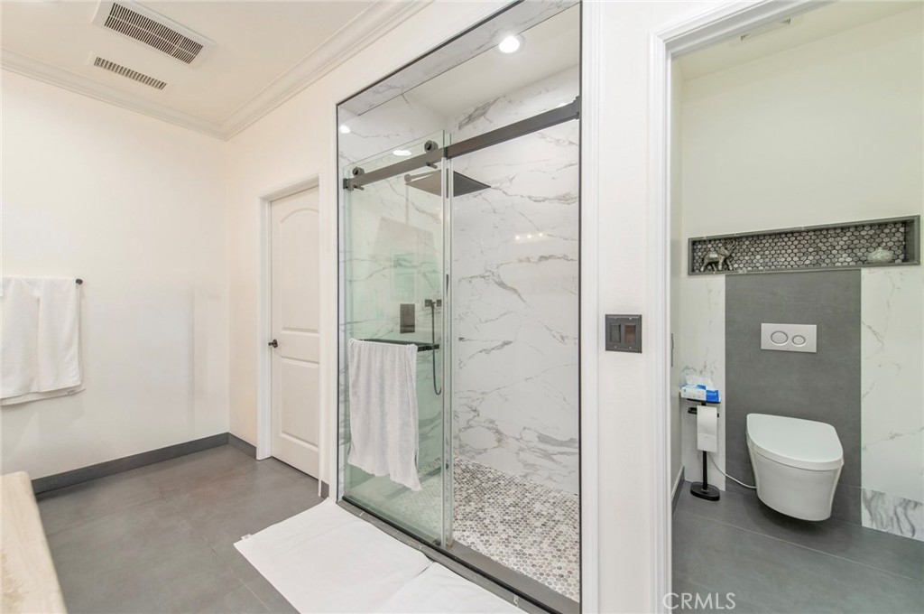 579 Boxwood Lane Azusa, CA 91702 - Photo 18 of 27 a bathroom with a granite countertop sink a toilet and shower