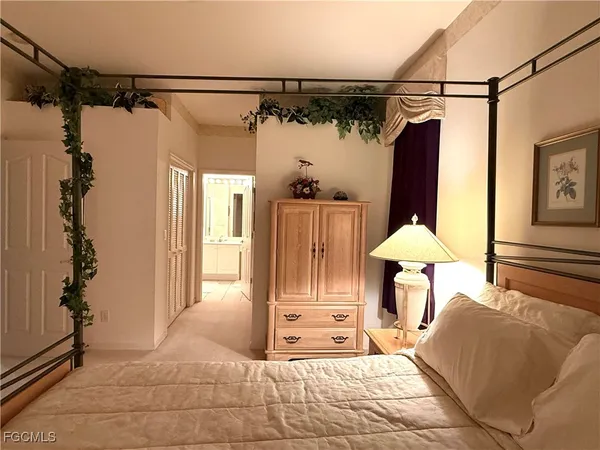 a view of a room with a furniture and a window