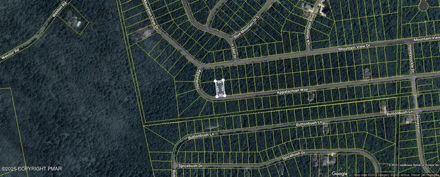 a view of a room with a window and wooden floor