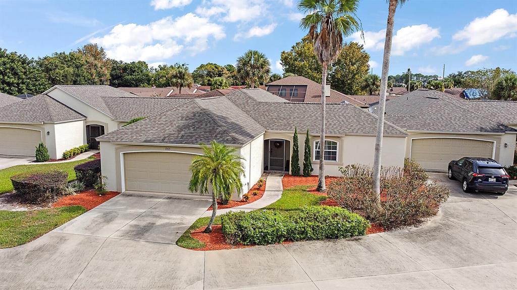1965 Banning Beach Road, Unit 3 Tavares, FL 32778 - Photo 1 of 1 a view of house with outdoor space and garden