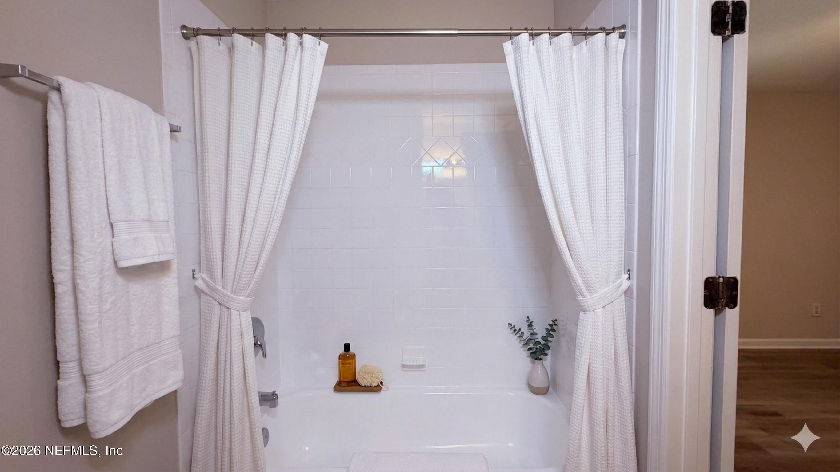8678 Sibbald Road Jacksonville, FL 32208 - Photo 7 of 24 a view of a bathroom