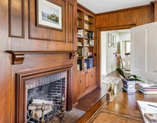 61 Musketaquid Road Concord, MA 01742 - Photo 12 of 19 a living room with furniture a rug and a fireplace