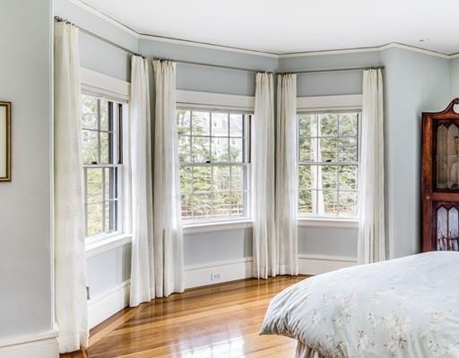 61 Musketaquid Road Concord, MA 01742 - Photo 16 of 19 a bedroom with a bed and a window