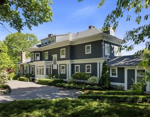 61 Musketaquid Road Concord, MA 01742 - Photo 2 of 19 a front view of a house with a yard