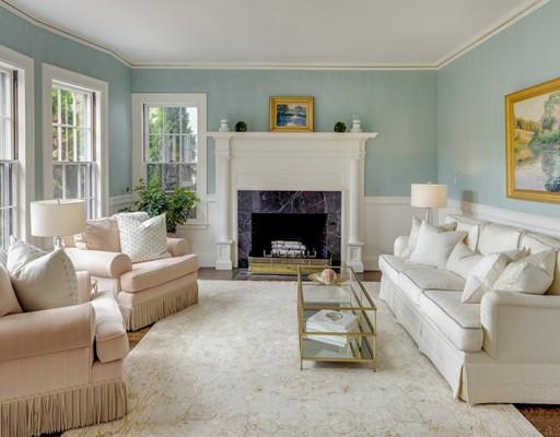 61 Musketaquid Road Concord, MA 01742 - Photo 8 of 19 a living room with furniture and a fireplace