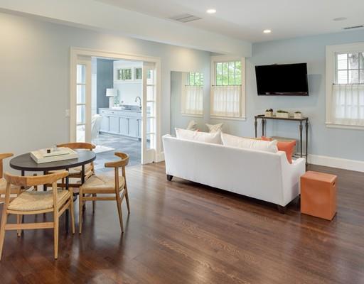 61 Musketaquid Road Concord, MA 01742 - Photo 10 of 19 a living room with furniture and a flat screen tv