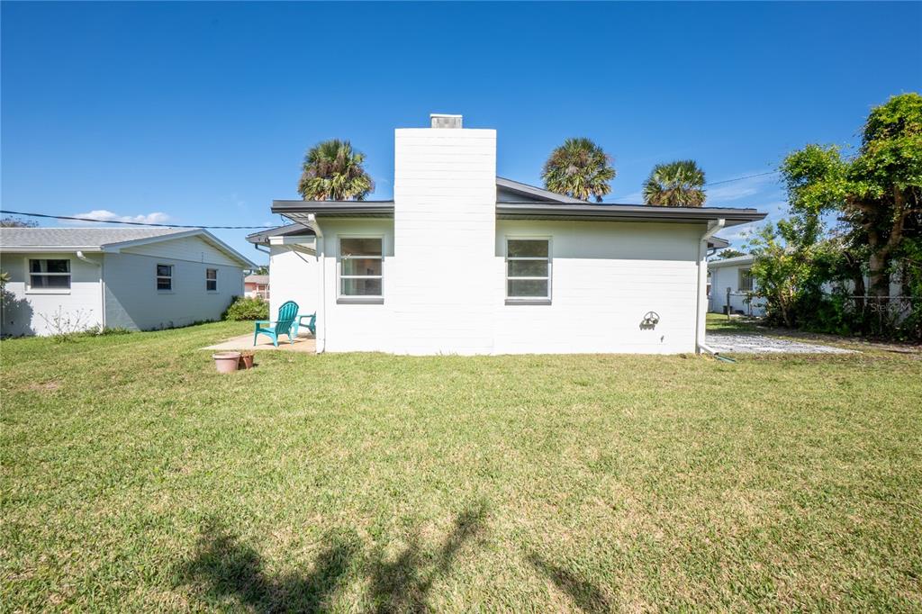 24 Berkley Road Ormond Beach, FL 32176 - Photo 33 of 44 a view of a house with a yard