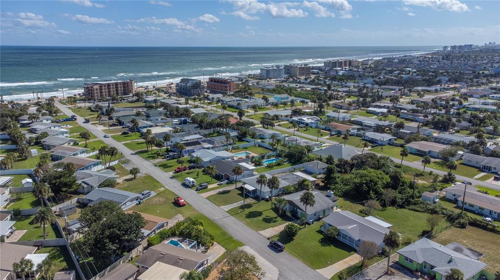 24 Berkley Road Ormond Beach, FL 32176 - Photo 44 of 44 an aerial view of residential houses with outdoor space